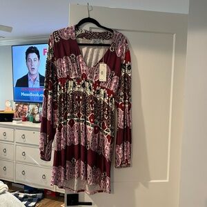 Brand new never worn still with tags size large beautiful dress